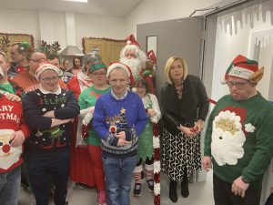 Margaret Mulligan and service users open the new premises