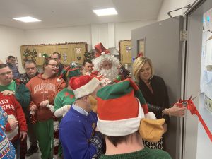 Margaret Mulligan and service users open the new premises