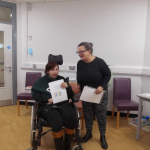 Service User receives their certificate for completing the Safer Eating and Drinking Programme from Janice McAllister