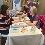 Service Users having some reflexology at the Breastfeeding Peer Support Event at Manor House