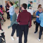 Staff and Service Users dancing at the Easter Disco