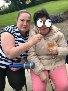 Service User And Staff Enjoying The Summer Party At Mantlin Court