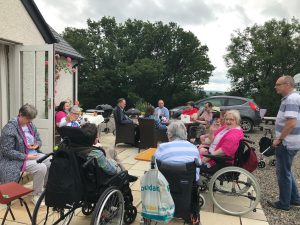 Service Users Enjoying The Summer Party At Mantlin Court