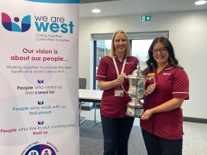 Emer Ferguson and Sinead McLaughlin with the Mission Cup
