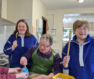 Creamery House Service Users baking an Easter Cake