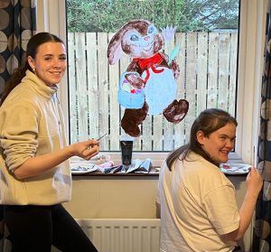 Creamery House Staff with their window painting