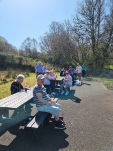 Service Users and staff enjoying a walk in the good weather