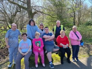 Service Users and staff enjoying a walk in the good weather
