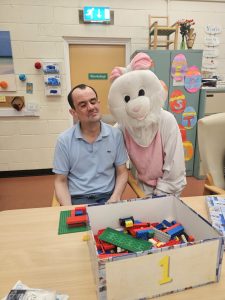 Kesh Day Centre service user Enjoying the Easter Bunny Visit