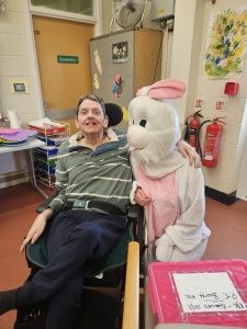 Kesh Day Centre service user Enjoying the Easter Bunny Visit