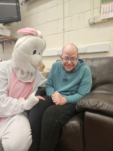 Kesh Day Centre service user Enjoying the Easter Bunny Visit