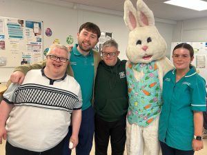 Service Users and staff with the Easter Bunny