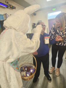 Service User and staff with the Easter Bunny
