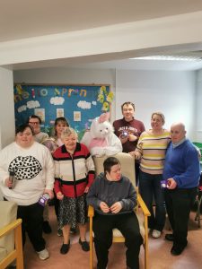 Service Users with the Easter Bunny at Tir Navar Day Centre
