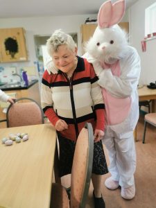 Service User with the Easter Bunny at Tir Navar Day Centre