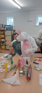 Service User with the Easter Bunny at Tir Navar Day Centre