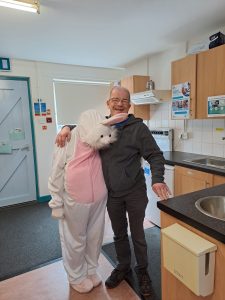 Service User with the Easter Bunny at Tir Navar Day Centre