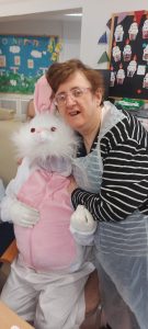 Service User with the Easter Bunny at Tir Navar Day Centre