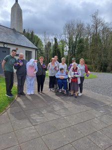Service users and Staff enjoying the easter hunt at Tir Navar