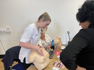 Breast Screening Radiographer demonstrating at the enniskillen roadshow event