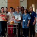 Neonatal Nurses with a patient and their mum at the South West Acute Hospital