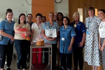 Neonatal Nurses with a patient and their mum at the South West Acute Hospital