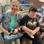 Service Users enjoying the visit from Kidz Farm