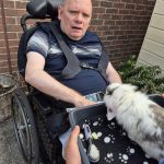 Service User enjoying the visit from Kidz Farm