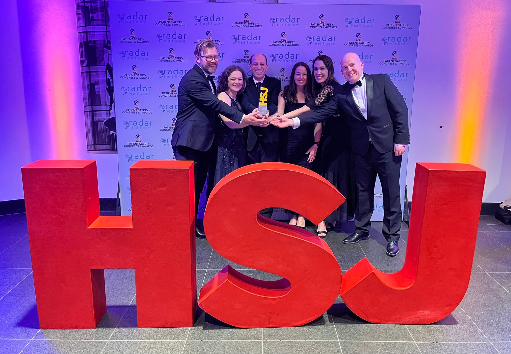 Western Trust Staff at the HSJ Awards with their award