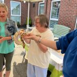 Service User enjoying the visit from Kidz Farm