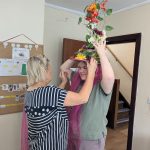 Service User and Staff with their best hat entry