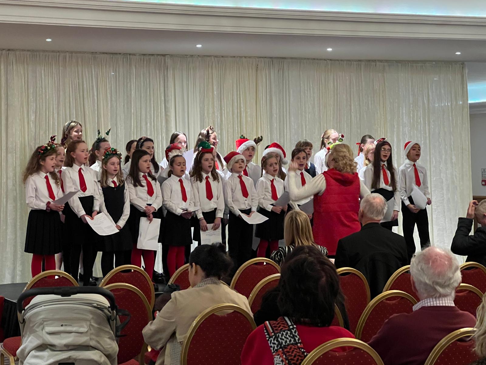 Primary School Choir performing at the Carers Christmas Carol Service