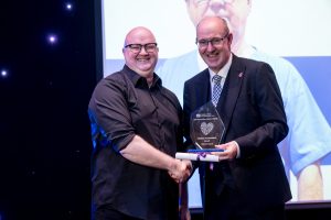 Lifetime Achievement Award Accepted On Behalf Of Hubert Lynch Mortuary Attendant Altnagelvin Hospital presented by Neil Guckian