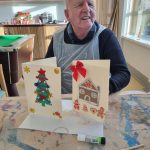 Service User with their Christmas Cards
