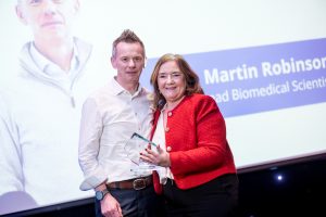 Martin Robinson Lead Biomedical Scientist Altnagelvin Gerry McKenna Award For Excellence In Health Science presented by Geraldine McKay