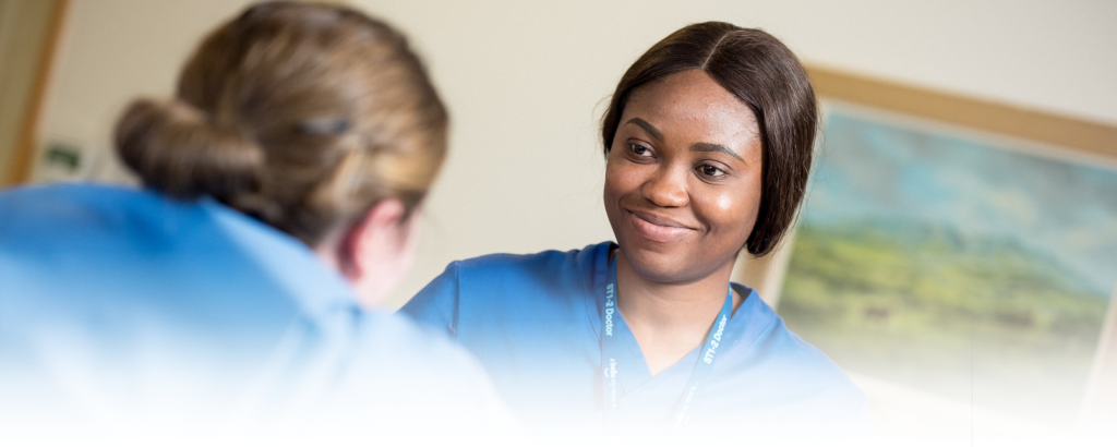 Female Doctor speaking with patient