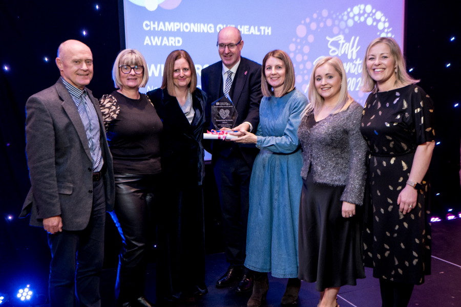 NWCC Health & Wellbeing Steering Group Altnagelvin Winners Championing Our Health Award presented by Neil Guckian