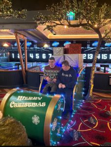 Service Users Enjoying Their Trip To The Bowling Alley