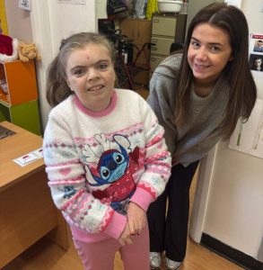 Service User And Staff In Christmas Jumper