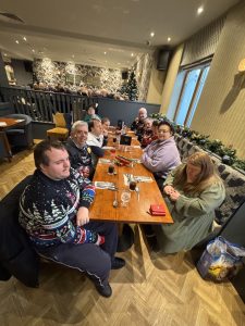 Strathroy Day Centre Service User enjoying their Christmas Dinner