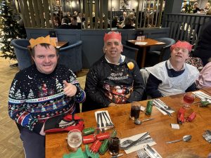 Strathroy Day Centre Service User enjoying their Christmas Dinner