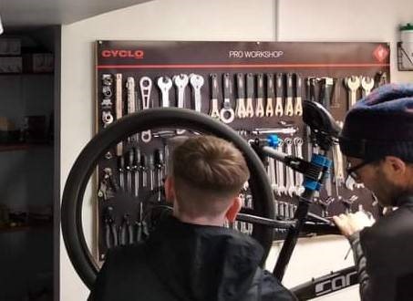 Boy restoring bike