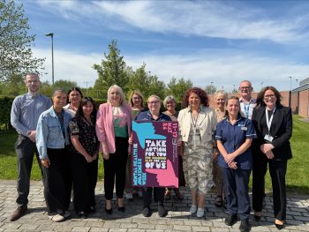 Western Trust staff supporting Mental Health Awareness Week (11 May to 17 May 2026 from left to right are: Thomas Smith, Head of Service, Recovery and Supported Living (interim); Ellie Leonard, Mental Health and Suicide Prevention Officer; Nadine Moore, Service Manager for Recovery; Jamie Wallace, Head of Service, Recovery; Colleen Harkin, Assistant Director Adult Mental Health Services; Sonia Campbell, Suicide Prevention and Emotional Health Equality, Health Improvement Equality and Involvement Department; Kellie McGillaway, Service Manager, Crisis Service; Maranna Donaghey Head of Service Primary Care and Specialist Services; Karen O’Brien, Director of Adult Mental Health and Disability Services; Valerie Spencer, Service Manager, Day Care; Helena Morrison, Governance Lead; Adrian Donnelly, Service Manager, Adult Psychological Therapy Services and Nuala Campbell, Towards Zero Suicide Improvement Manager