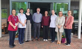 Western Trust Community Acquired Brain Injury Team (Northern Sector) highlighting Brain Injury Awareness Week (18 May to 24 May 2026) pictured from left to right are: Toni Durey, Brain Injury Nurse Specialist; Claire Glenn, Physiotherapist; Megan McElhinney, Trainee Clinical Psychologist; Martin Robinson, Team Manager, Community Brain Injury Service; Diane Devine, Admin Team; Carmel McCloskey, Occupational Therapist; Glenda Olphert, Social Worker and Dr Siobhan Palmer, Consultant Clinical Neuropsychologist and Clinical Lead, Community Brain Injury Team outside the North West Centre for Neurological Rehabilitation (NWCNR), Altnagelvin Hospital site.
