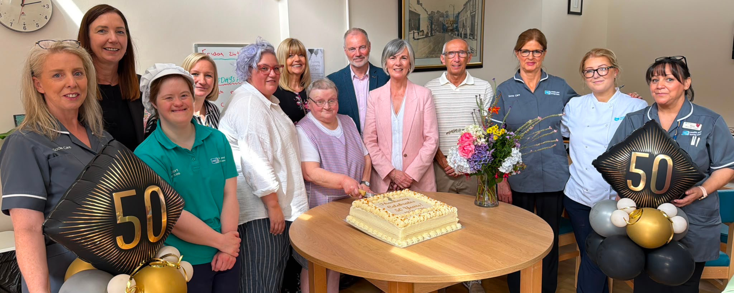Service Users and Staff at Thackeray Day Centre celebrating their 50th Birthday