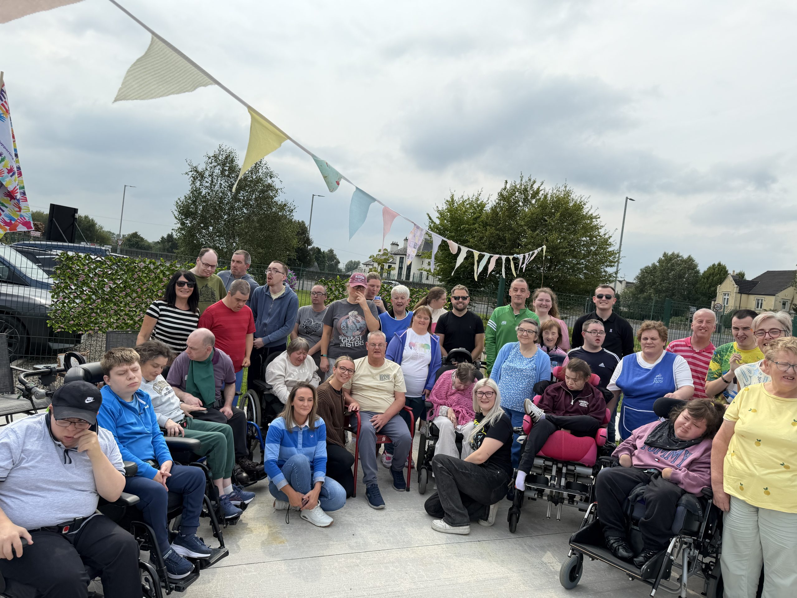 Killadeas Day Centre service users and staff at the opening garden party in garden setting