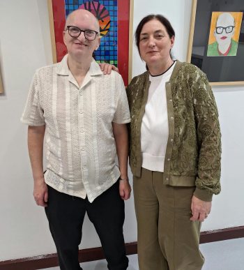 Artist Gerald Ogle is pictured with Vanessa Campbell Senior Day Care Worker Rossville Group